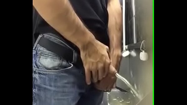 Urinal spy men pissing